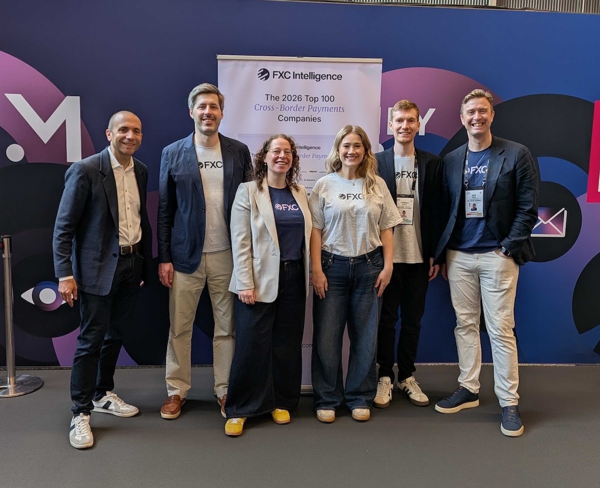A photo of FXC Intelligence's team at Money20/20 Europe 2026. From left to right: Daniel Webber (CEO and Founder), Cameron Graham (VP of Platform Products), Lucy Ingham (VP of Research), Kezia Johnson (Marketing and Communications Manager), Tom Bleach (Editorial Analyst) and Ben Disley (VP of Commercial)